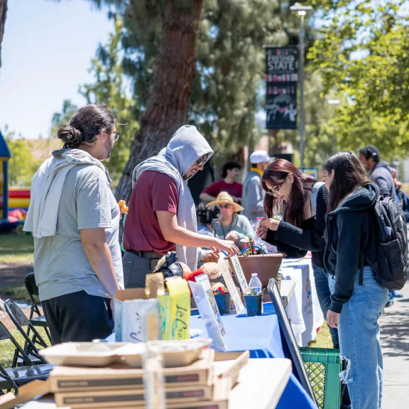 Students talk during a school fair