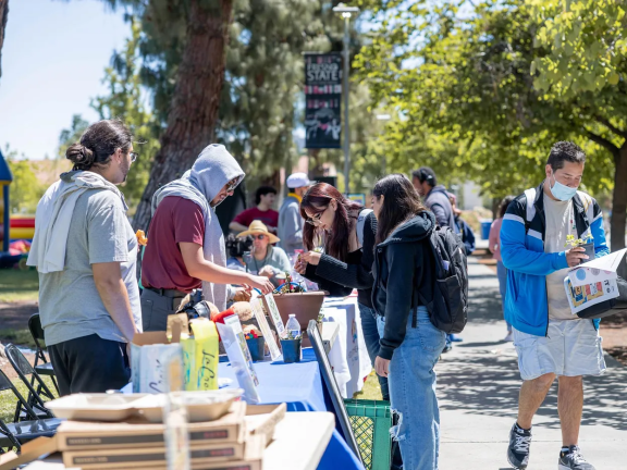 Students talk during a school fair