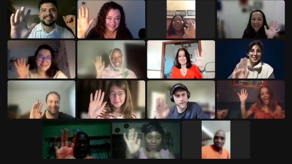 Train-the-Trainers participants wave on a Zoom screen