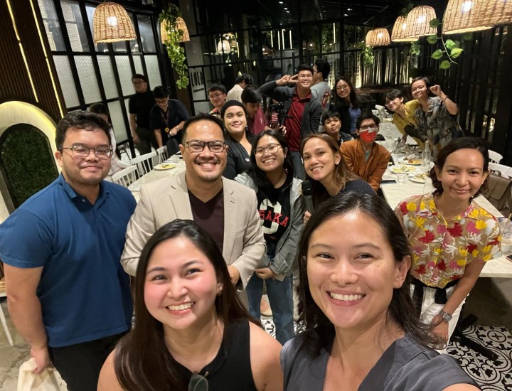 Journalists smile at the 10th Anniversary Party for Solutions Journalism in Manila, Philippines